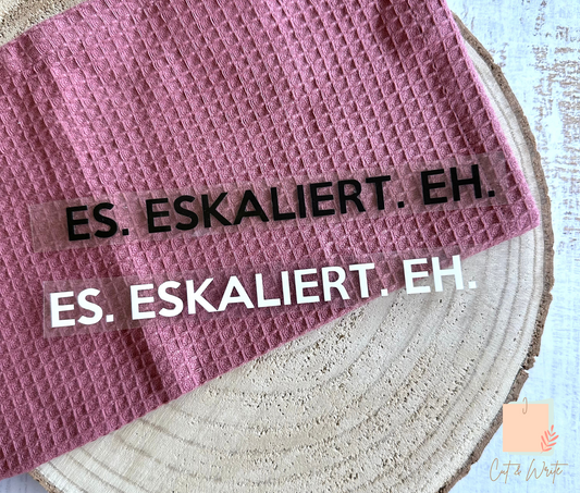 Bügelbild "ES. ESKALIERT. EH."